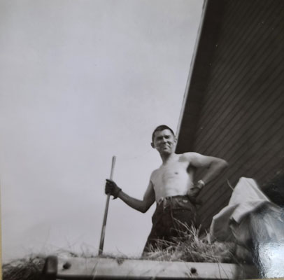 Taube helps on his brother's farm, likely in Summer, 1938 (Credit: USask Archives and Special Collections)