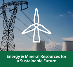 An illustration of a wind turbine overlays an image of a nuclear power plant and electrical power lines. Below the image reads 'Energy and mineral resources for a sustainable future'